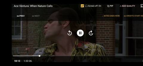 A movie playing on the car's Android Auto screen with BeeboTV